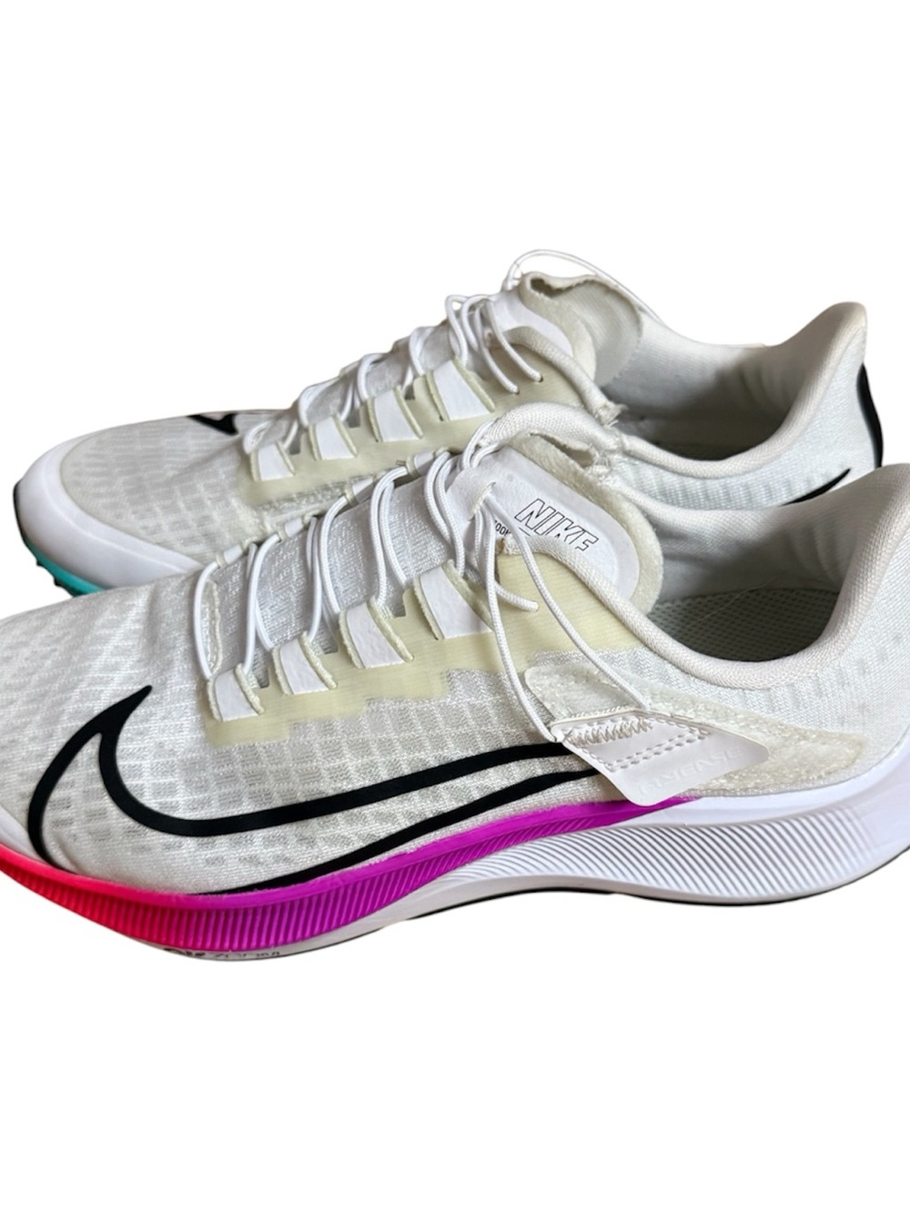 Nike Women's White Running Sneakers with Black and Pink Accents